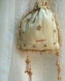 Off White Handcrafted Tissue Silk Chikankari Potli With Golden Lace