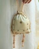 Off White Handcrafted Tissue Silk Chikankari Potli With Golden Lace